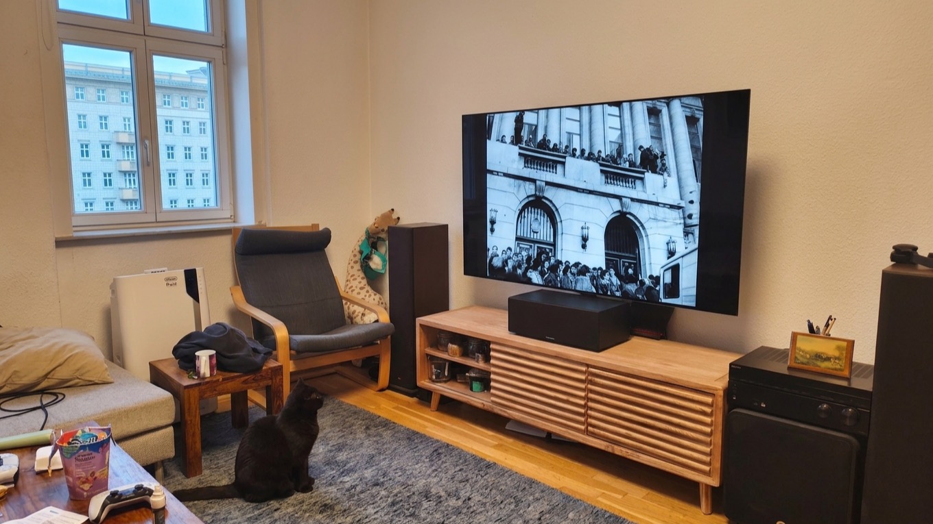 AI-generated historical scene 51: The Contemporary Finale (Present Day) — Home News Broadcast.